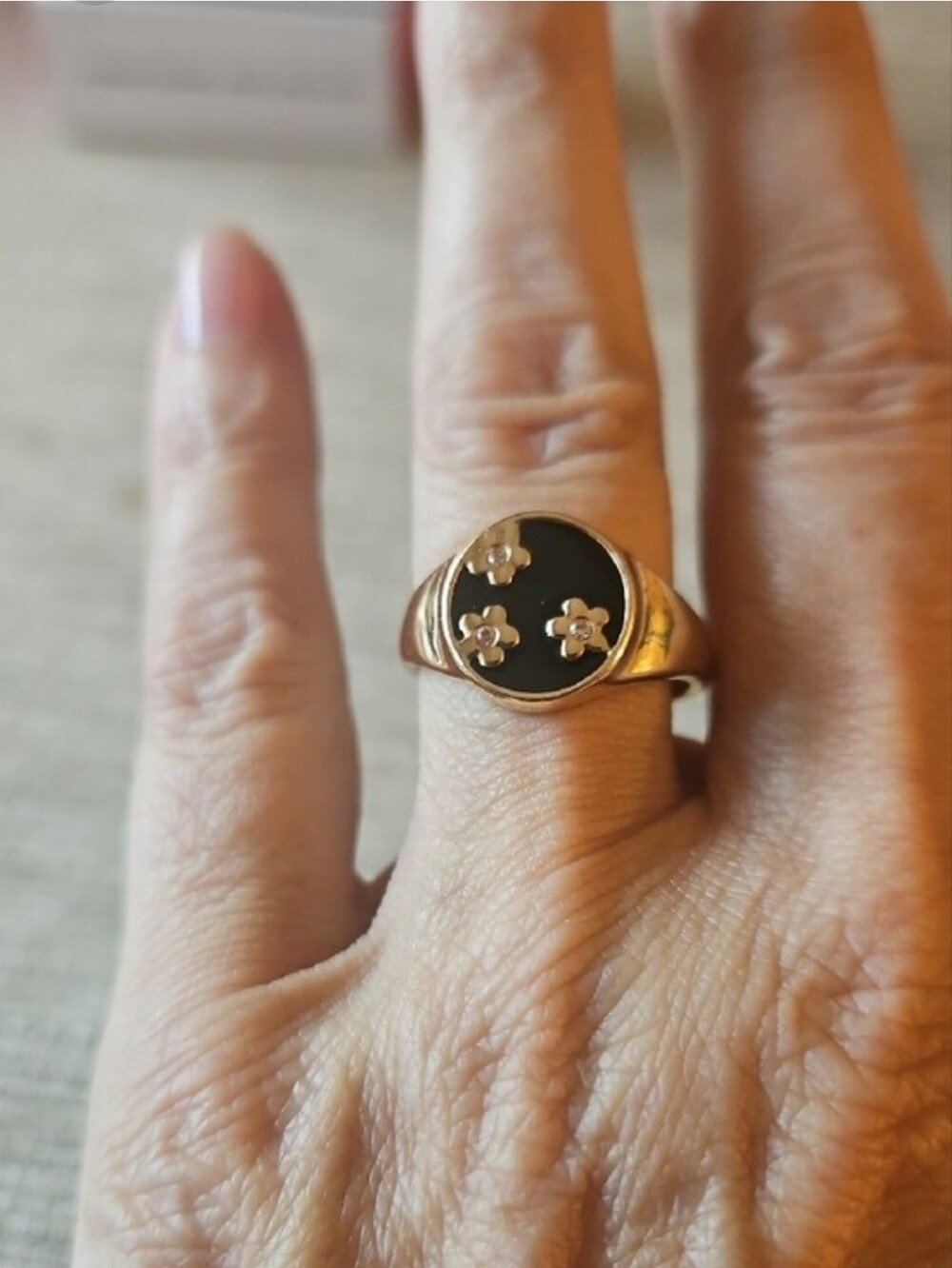 Avon Gold Tone Black Enamel Floral Signet Ring . Size 8